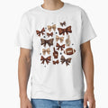 Coquette Bow Pumpkin American Football T-Shirt - Unique Graphic Unisex - T-Shirt, Sweatshirt, Hoodie