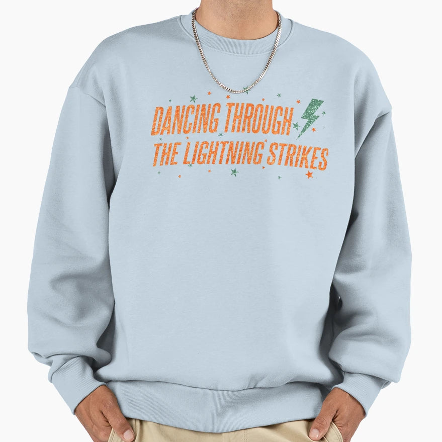 Dancing Through Lightning Strikes T-Shirt - Unique Graphic for Adults - T-Shirt, Sweatshirt, Hoodie